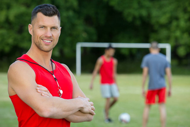 coach posing during football training - Foto, afbeelding