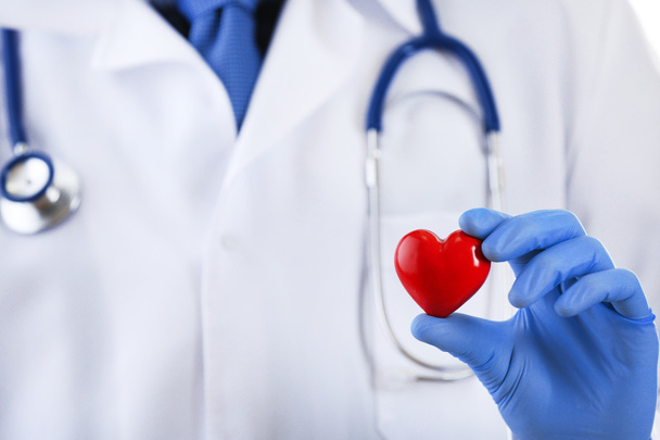 Doctor with stethoscope and small heart - Zdjęcie, obraz