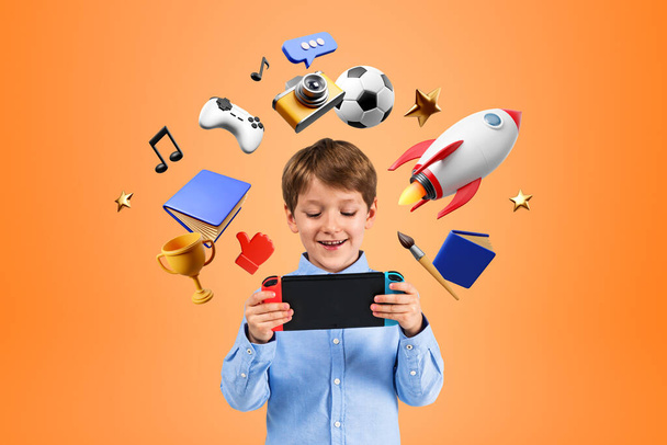 Smiling child with console in hands, playing video games and e-learning, future opportunities and art hobbies. Concept of online entertainment and education - Photo, Image