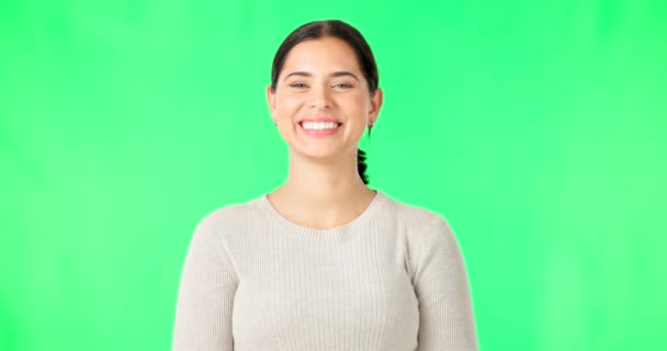 Green screen, face and woman with smile, happiness and confidence on color background, backdrop and chroma key. Portrait of happy female model with pride, good mood and carefree personality in studio. - Video, Çekim