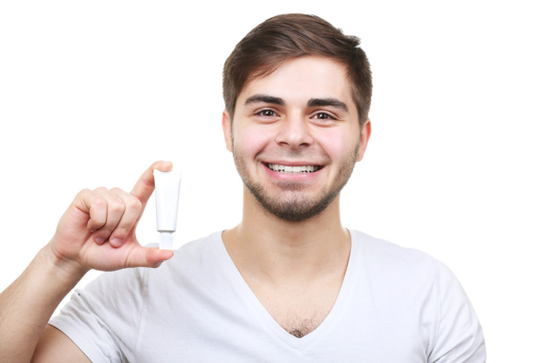 Young man with toothpaste - Foto, Imagen
