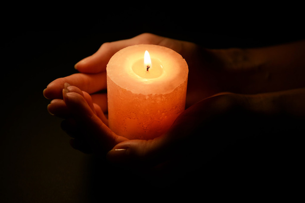 Candle in female hands - Valokuva, kuva