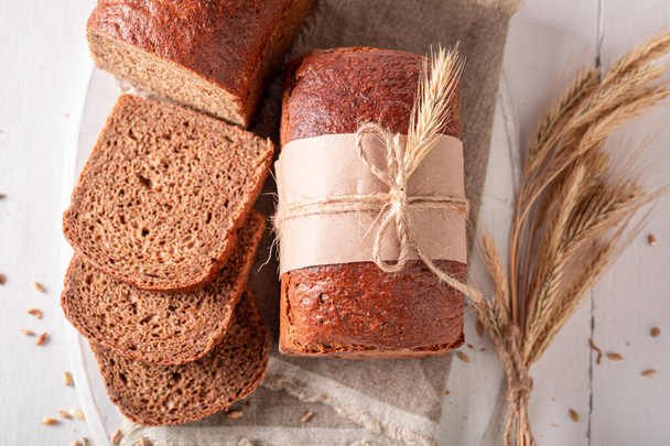 Tasty loaf of breads made of sourdough and flour. Multigrain homemade bread. - Foto, Imagem