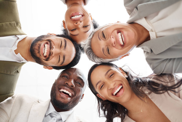 Portrait, below and business group of people with smile for career teamwork, team building and collaboration. Happy diversity staff, face of employees or men and women in circle for professional work. - Foto, imagen