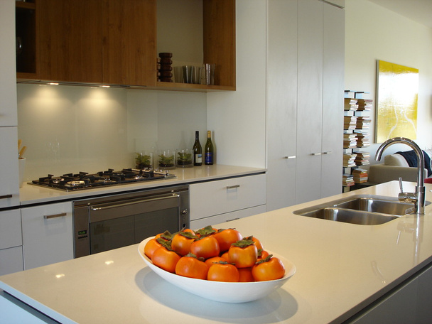 Modern kitchen warm tones open plan living - Foto, immagini