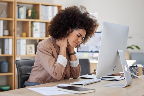 Burnout, office or woman with neck pain injury, fatigue or bad ache in a business or company desk. Posture problems, tired girl or injured female worker frustrated or stressed by muscle tension. - Photo, Image