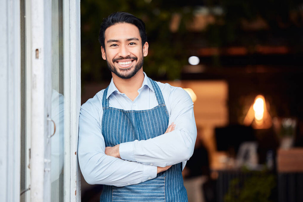 Asian man, portrait smile and arms crossed in small business at restaurant for welcome, service or job at door. Happy male entrepreneur in confidence at entrance ready to serve in coffee shop or cafe. - Φωτογραφία, εικόνα