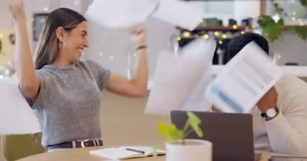 Business people, celebration and high five with documents for winning, teamwork success or completion at the office. Happy man and woman touching hands for finished paperwork, freedom or victory win. - Footage, Video