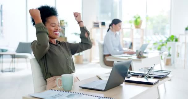 Laptop, celebration and black woman in business achievement, target goals or motivation. Happy female worker, computer or celebrate success in office of winner, bonus or fist of winning surprise deal. - Filmmaterial, Video