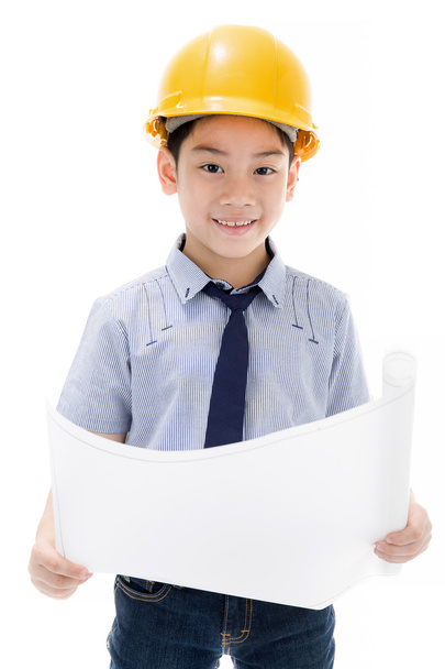 Jovem asiático criança engenheiro de construção Segurando equipamentos
 - Foto, Imagem