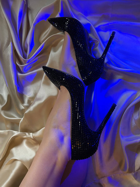 Woman sensual sexy legs in sparkly high heels, ladies shoes concept - Foto, Imagen