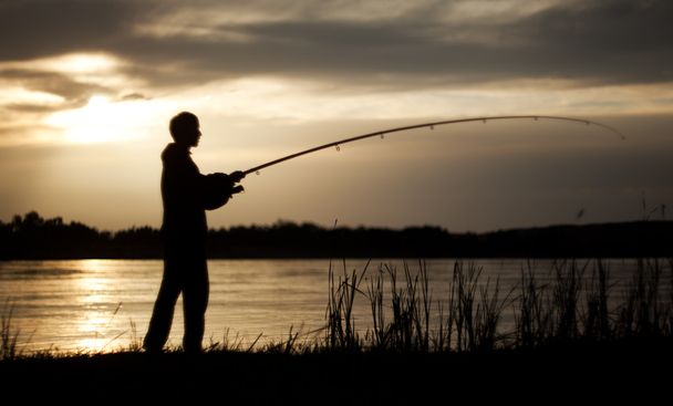 El pescador al atardecer
 - Foto, Imagen