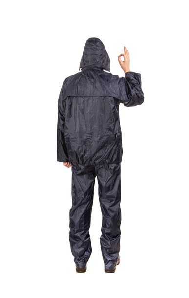 Man in black rain coat. - Foto, afbeelding