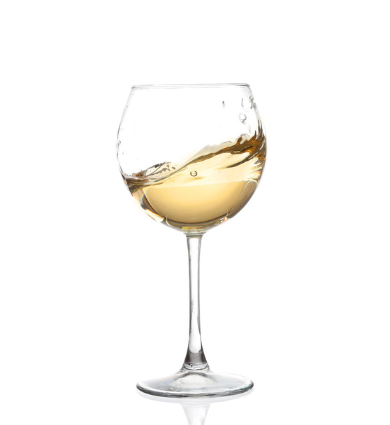 WHITE wine swirling in a goblet wine glass, isolated on a white background - Zdjęcie, obraz