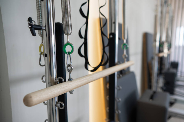 Close-up of a detail of a reformer machine. Pilates studio without people - Foto, imagen
