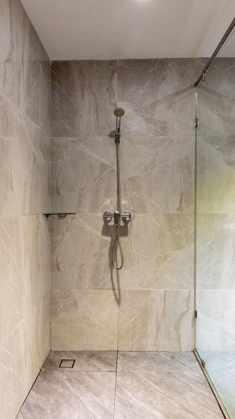 Shower at bathroom. Bathroom interior . Luxury fully tiled shower with rain head and hand held shower rose.	 - Foto, Imagen