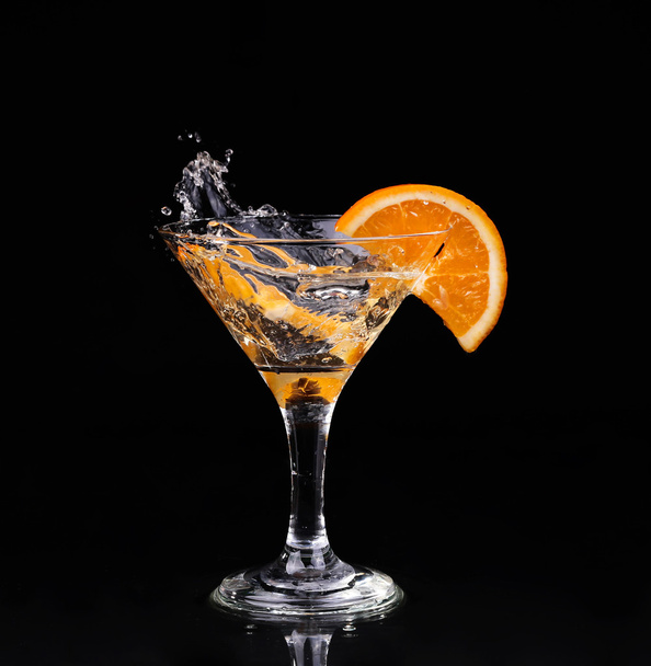 Vermouth cocktail inside martini glass over dark background - Fotografie, Obrázek