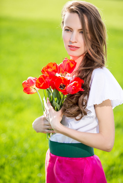 Woman with tulips - 写真・画像