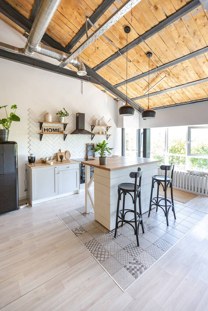 stylish kitchen interior design. white walls and wooden decoration. beautiful hammock and high windows. - Fotoğraf, Görsel