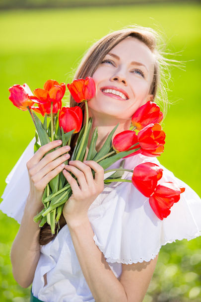 Woman with tulips - Fotoğraf, Görsel
