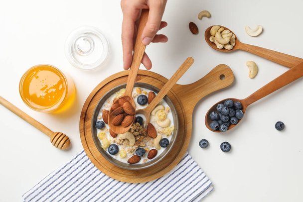 Tasty and nutritious breakfast concept - muesli with yogurt - Foto, imagen