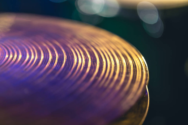 Drum cymbal close-up on a dark blurred background, music concert concept, percussion instrument. - 写真・画像