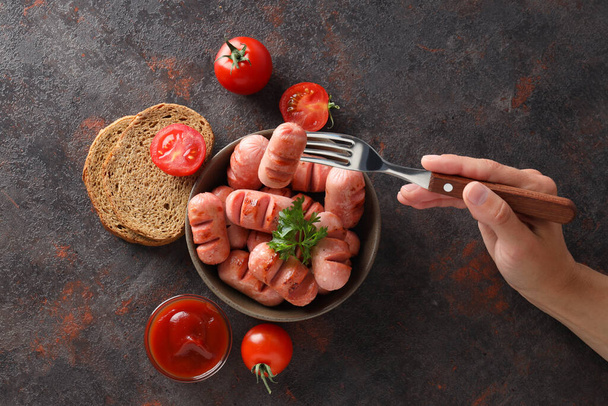 Concept of tasty food, grilled mini sausage, top view - Foto, Bild