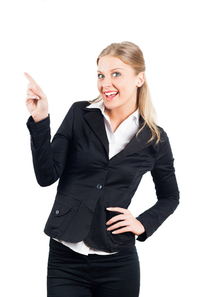 Cheerful businesswoman pointing at your product - Photo, image