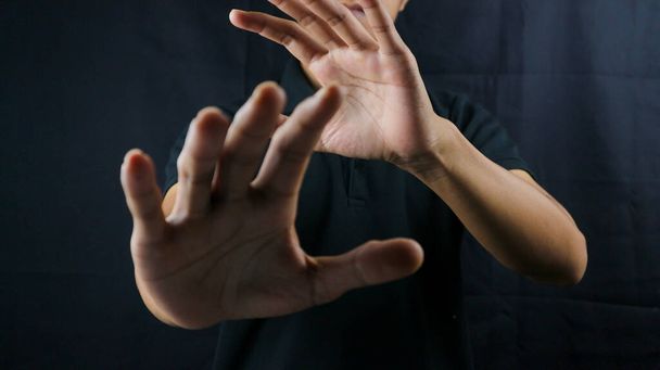 Refusal gesture hands on black background. refused to be invited. rejection. refuse business. - Foto, Imagem