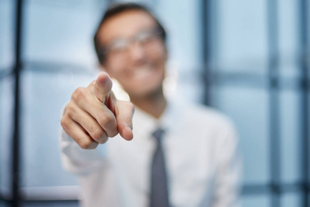 business man points his finger at you - Photo, image