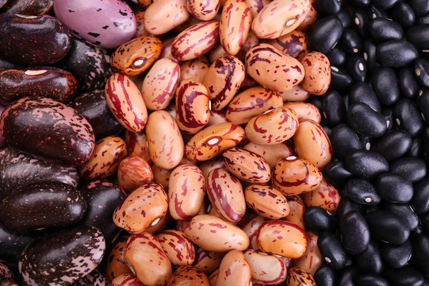 Different kinds of beans as background, closeup - Φωτογραφία, εικόνα