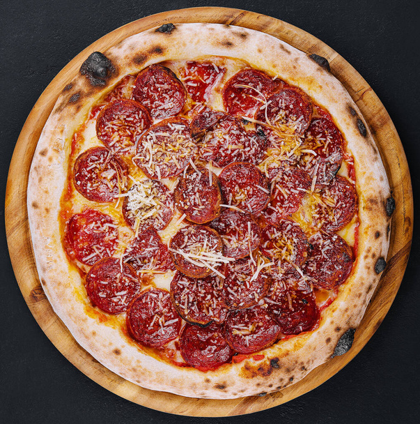 Italian pepperoni pizza on top view - Zdjęcie, obraz