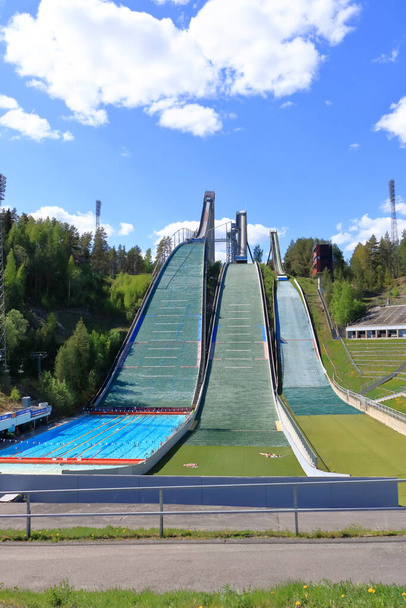 Aerial view of sports centre with three ski jump towers in the summer, Lahti in Finland - Photo, Image