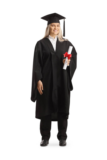 Full length portrait of a female graduate student holding a certificate isolated on white background - Zdjęcie, obraz