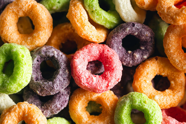 Colored breakfast cereals, food background, childrens healthy breakfast, close up. - Photo, Image