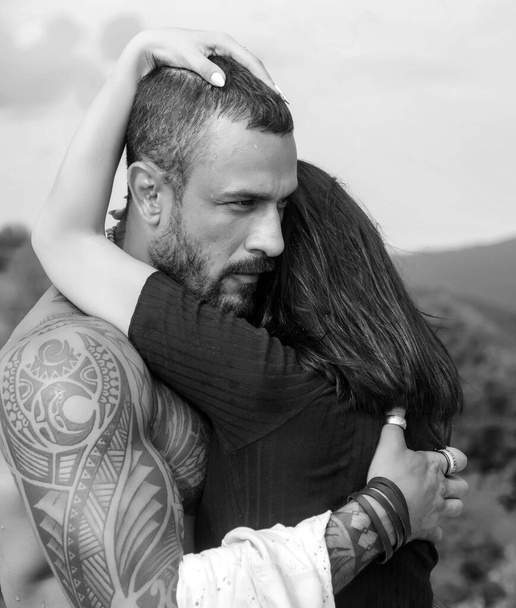 Love story. Beautiful young couple hugging. Love concept. Couple is hugging. Passion love couple. Romantic moment. Handsome muscular guy and amazing woman - Zdjęcie, obraz
