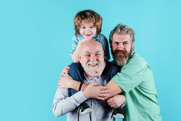 Happy man family concept laugh and have fun together. Three generations ages: grandfather father and child son together. Male Multi Generation Family, isolated - Φωτογραφία, εικόνα