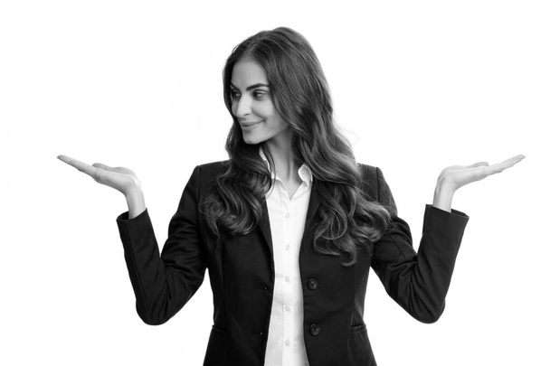 Woman point at copy space, showing copyspace pointing. Promo, girl showing advertisement content gesture, pointing with hand recommend product. Isolated white background - Foto, imagen