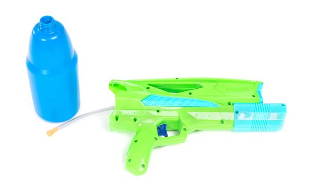 Plastic water gun isolated over white background - Photo, Image