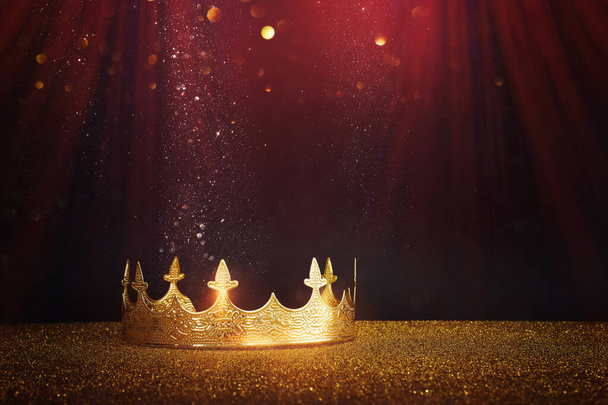 low key image of beautiful queen or king crown over glitter table. fantasy medieval period - Foto, Imagem