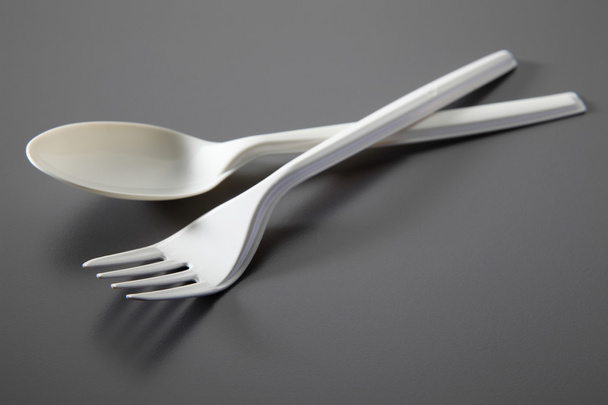 Plastic fork and spoon - Фото, зображення