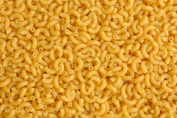 Vista superior de la pasta italiana sin cocer. Textura alimenticia. - Foto, Imagen