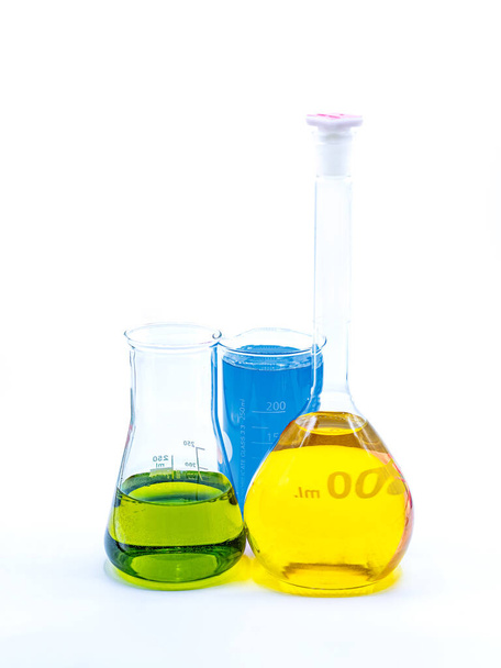 Glass chemistry in a white background. Selective focus - Foto, Imagen
