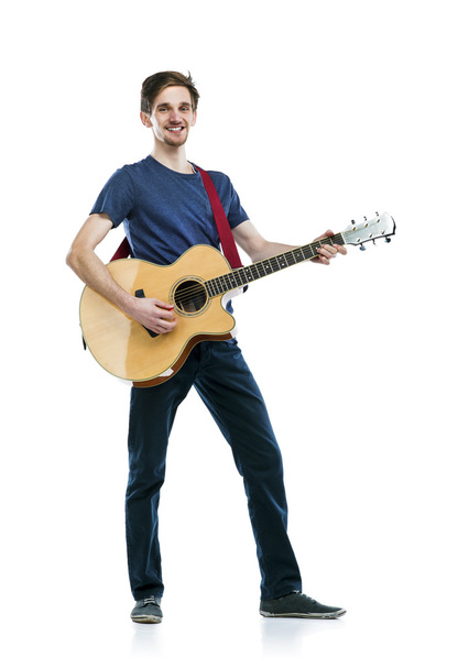 Guitar player with his instrument. - Foto, Bild