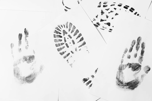 Shoe and palm prints.  For study in the crime lab.  - Foto, Bild