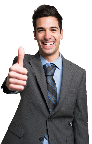 Businessman giving thumbs up - Фото, изображение