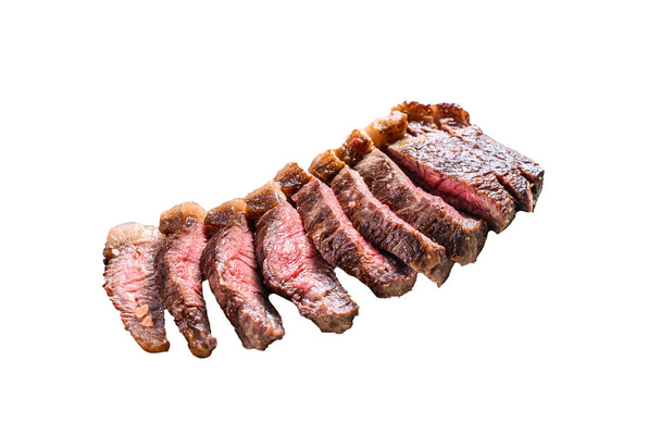 Grilled top sirloin cap or picanha steak on a meat cleaver with herbs. Isolated on white background - Photo, Image