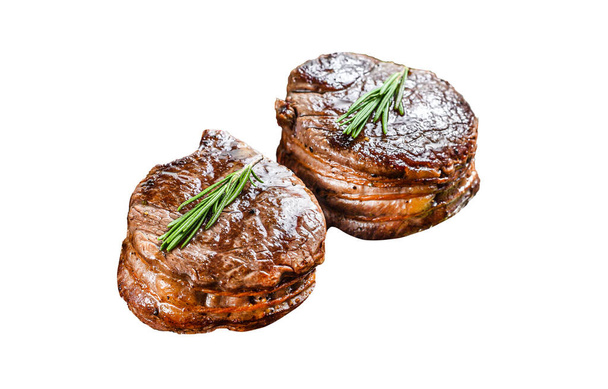 Medallions steaks from the beef tenderloin. Isolated on white background - Photo, Image
