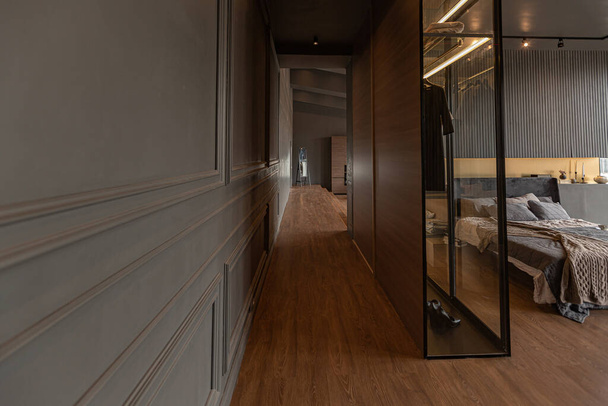 chic modern design of a dark expensive interior of a luxurious cozy apartment - Valokuva, kuva