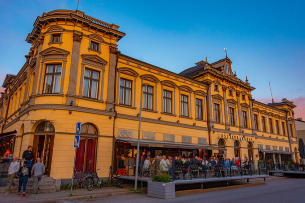 Oulu, Finland, July 22, 2022: Sunset view of Kauppatori square in Finnish town Oulu. - 写真・画像